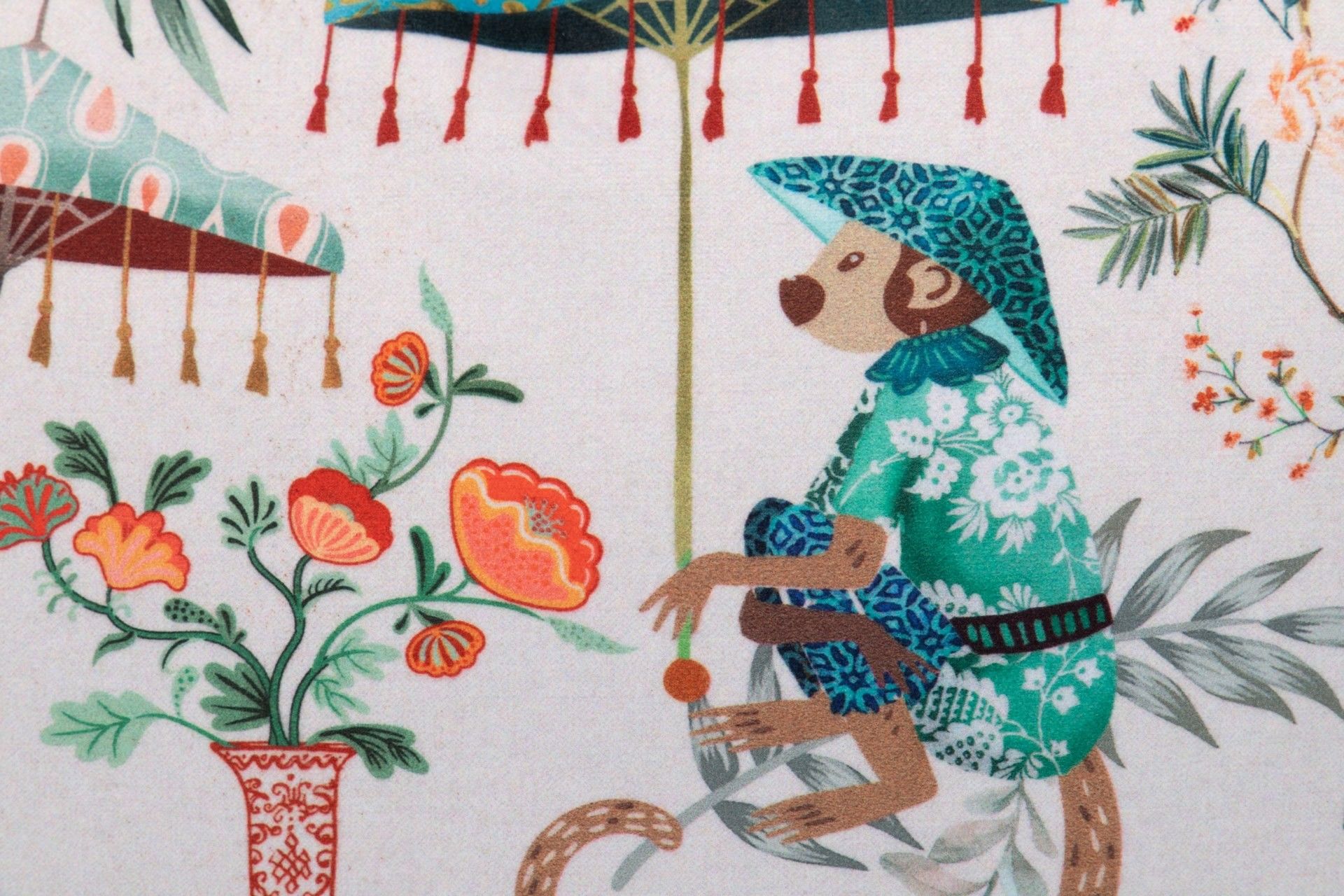 ALMOFADA DE MACACO COM FOLHAS TROPICAL 45x13x30 CM